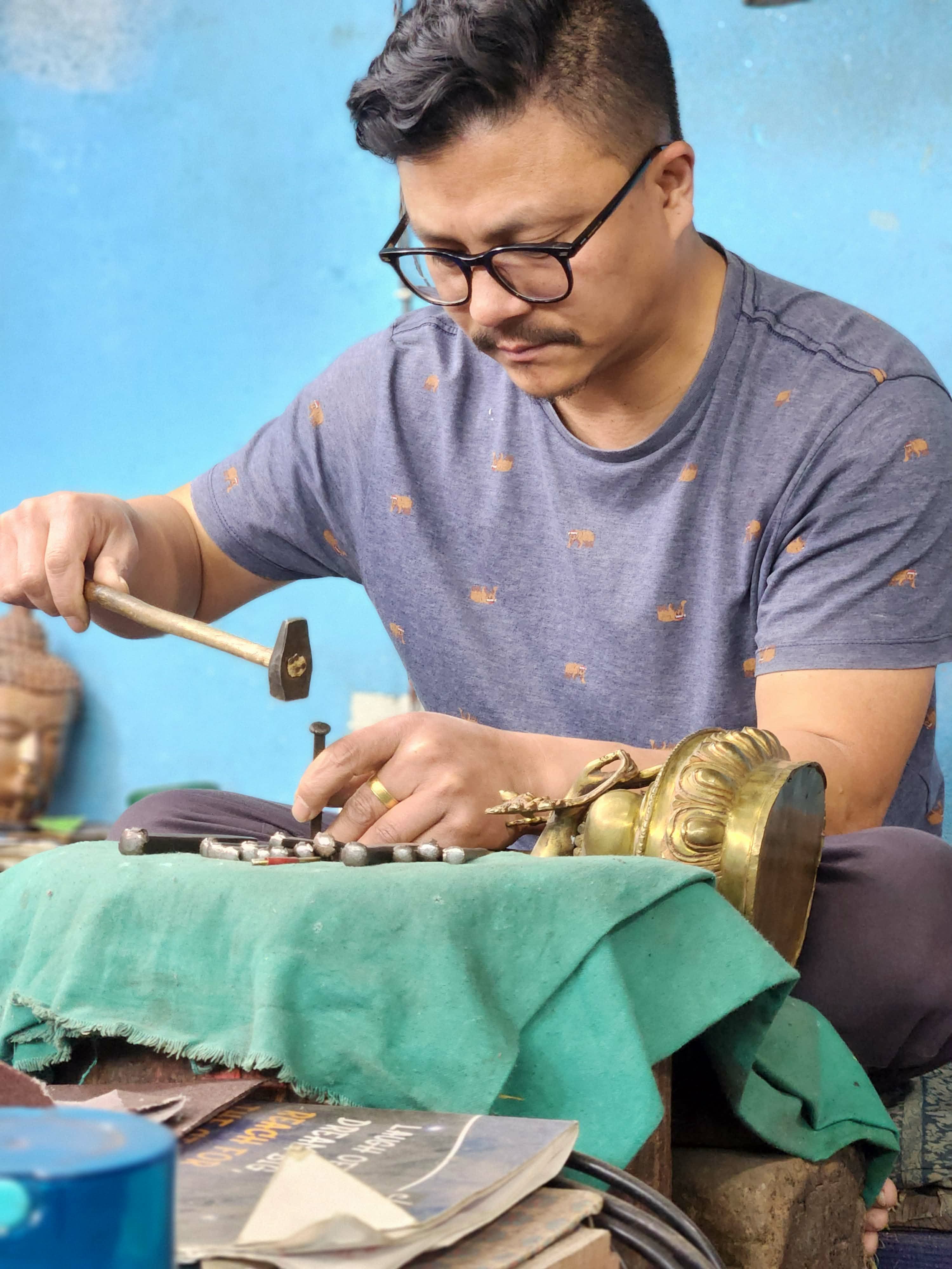 Craftsman at work in the Patan workshop